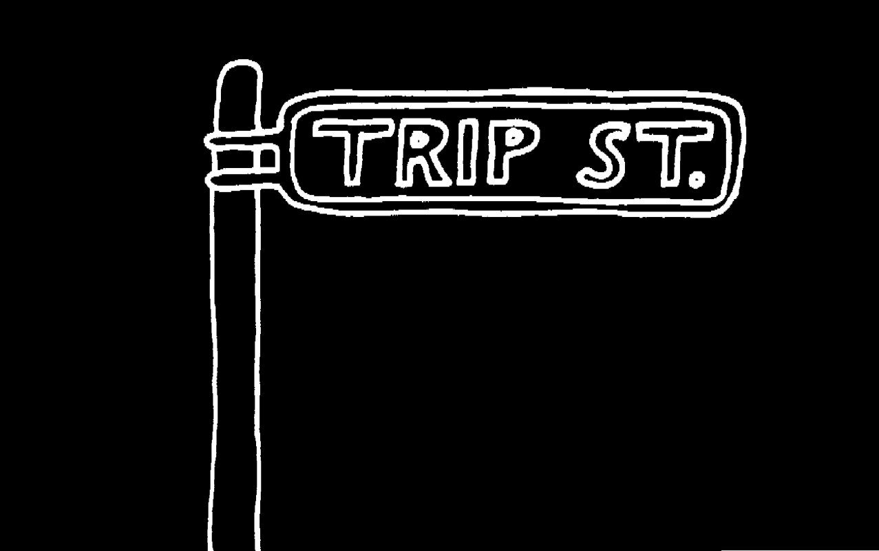 Street sign reading "Trip St." on black background.